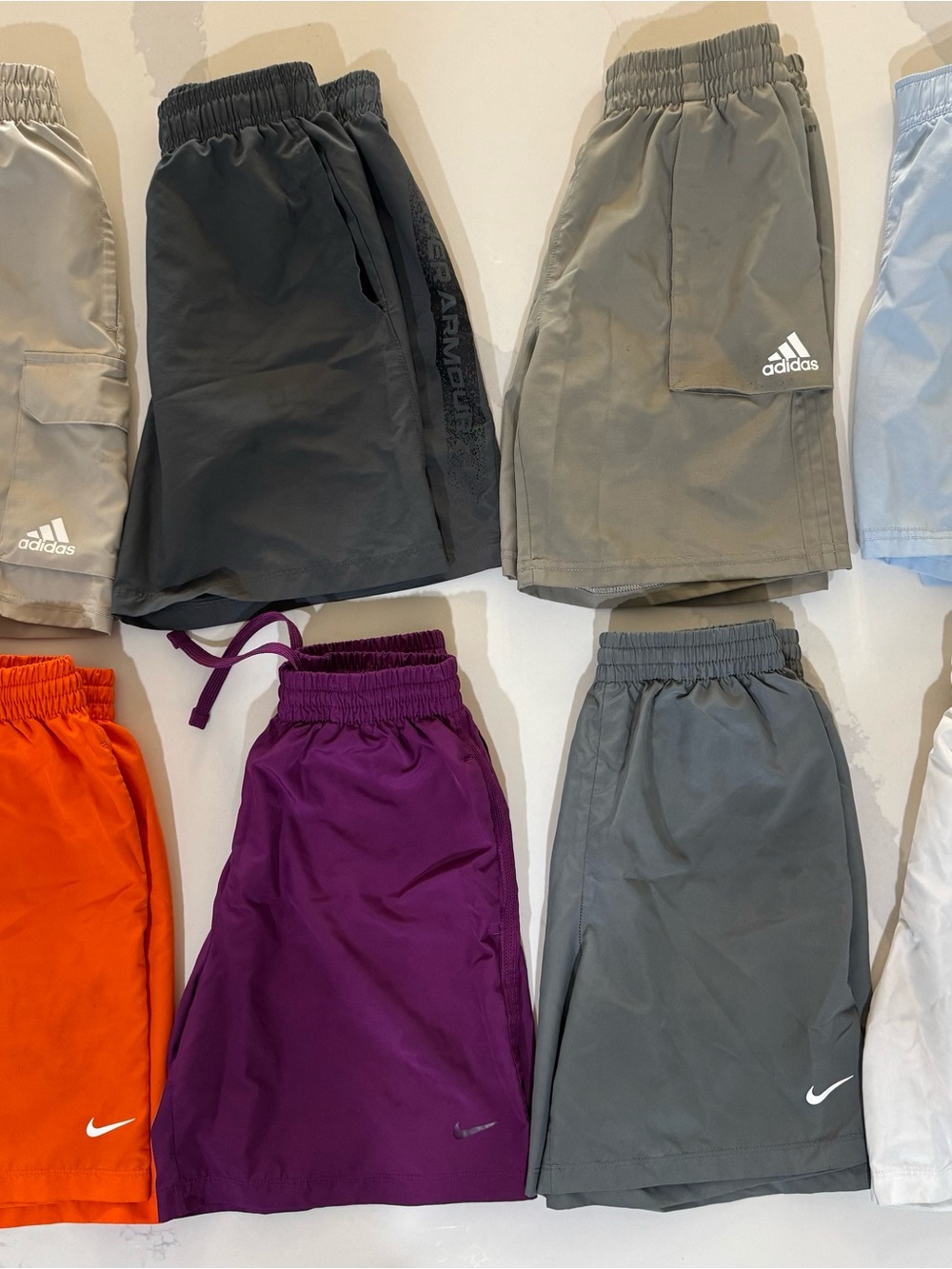 8 Pairs Nike, Adidas, Under Armour Boys Size Medium Shorts Assorted Colors.